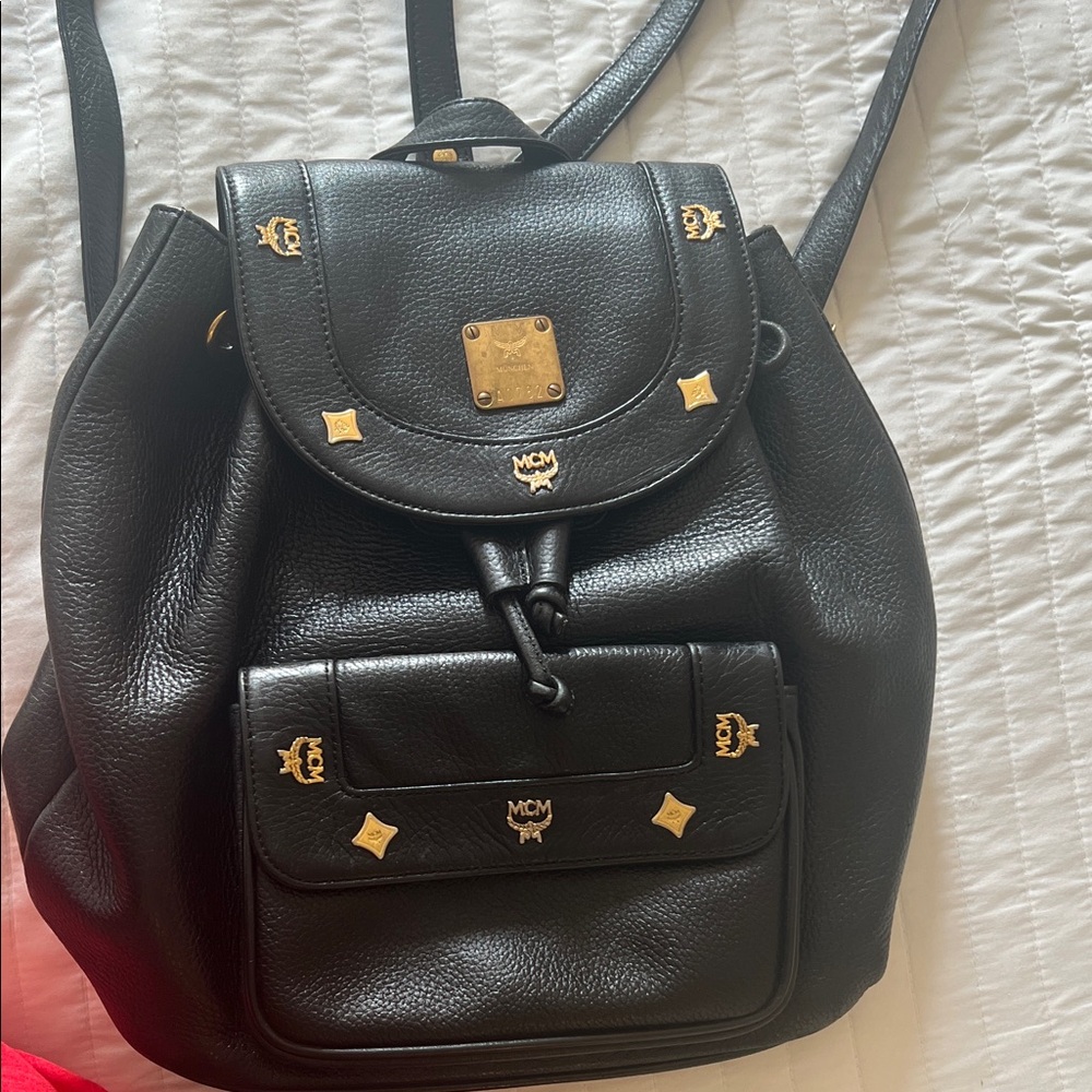 MCM Black Backpack with Gold Details